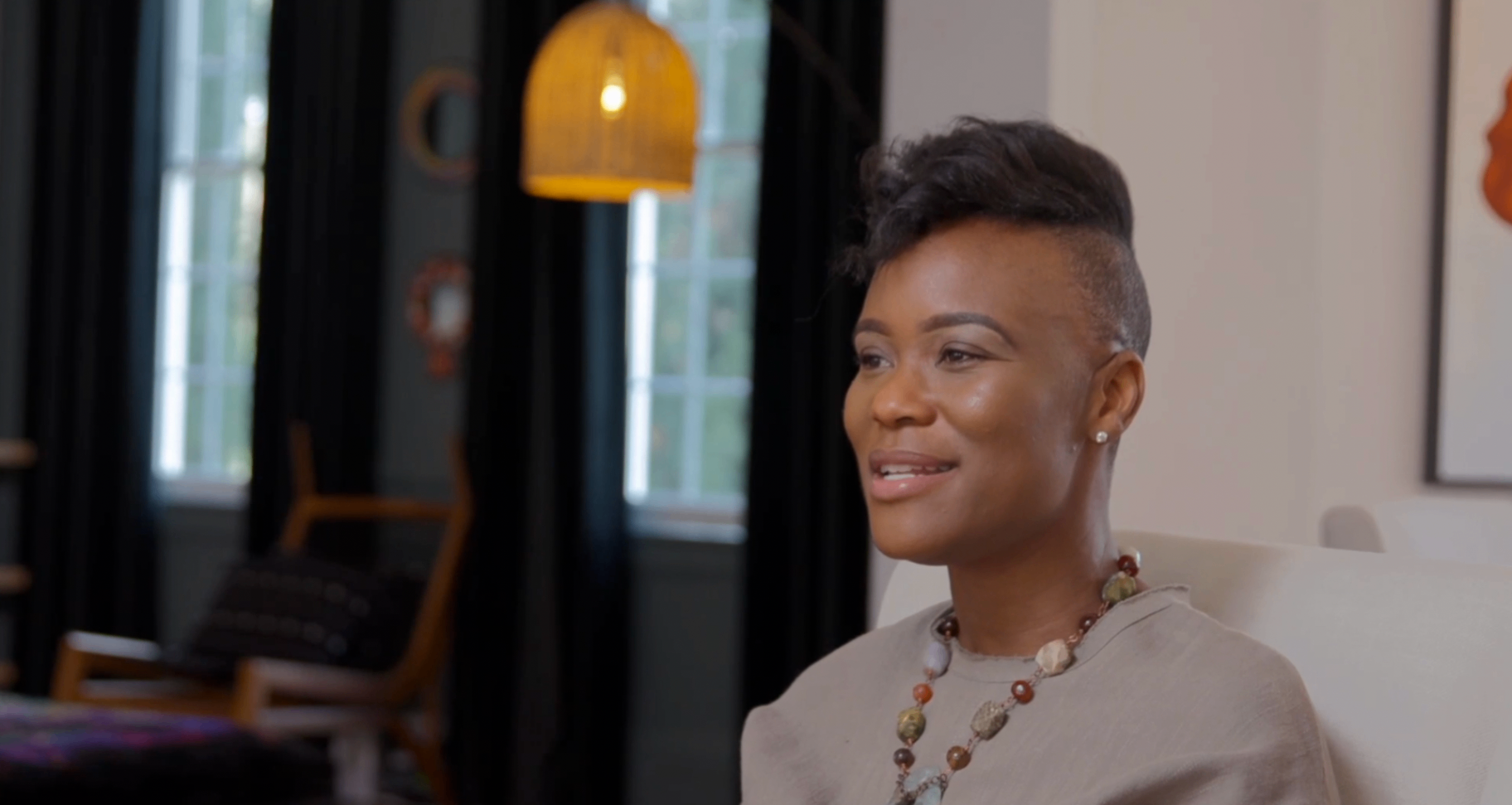 Danielle Taylor seated for an on-camera interview